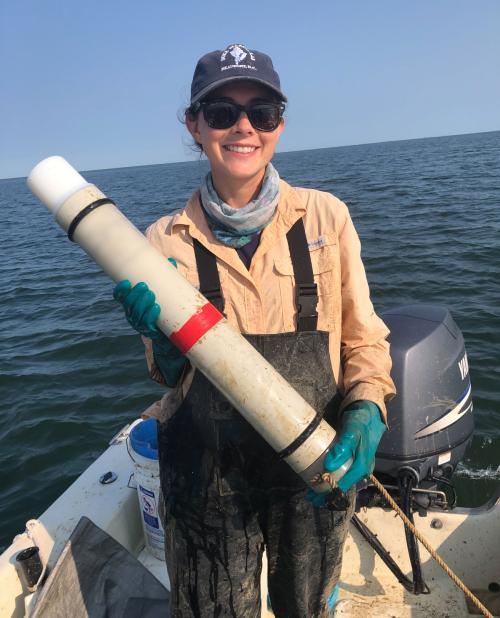  Ann-Marie Jacoby is holding a cleaned hydrophone she deployed in the Potomac River to collect data on bottlenose dolphin seasonal distribution.