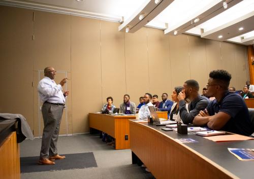 Speaker talking to students during information session