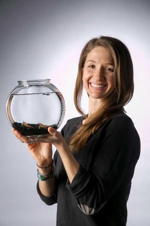 Picture of Eleanor Caves holding a goldfish bowl.