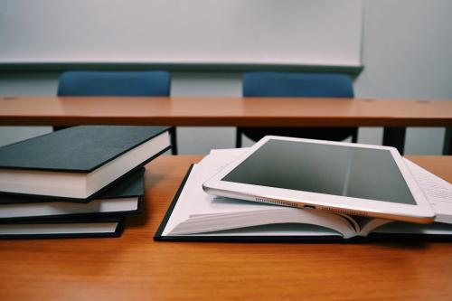 Image of books and tablet