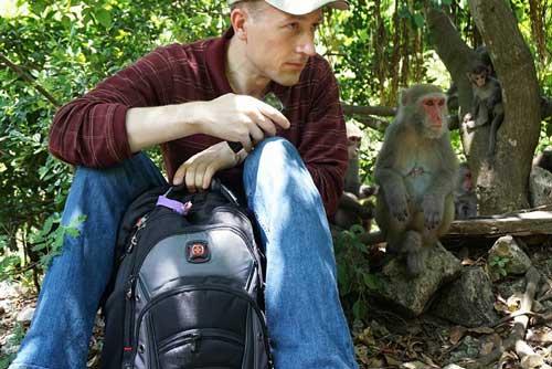 Jeffrey Nicolaisen (left) and Taiwanese macaque (right), Gushan Mountain, Taiwan