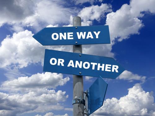Signpost reading "one way or another"